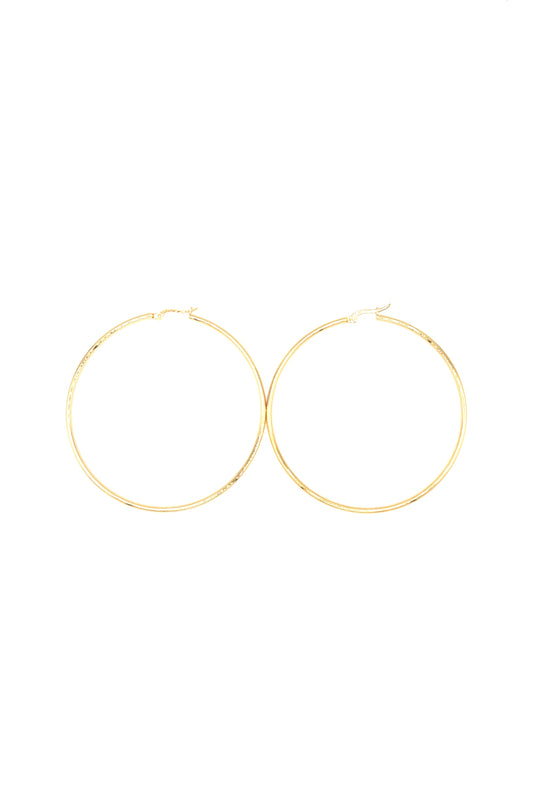 Gold plated large hoop earrings displayed flat