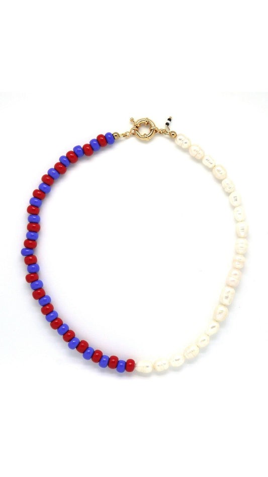Layered necklace detail showing vibrant Puerto Rican-inspired beading