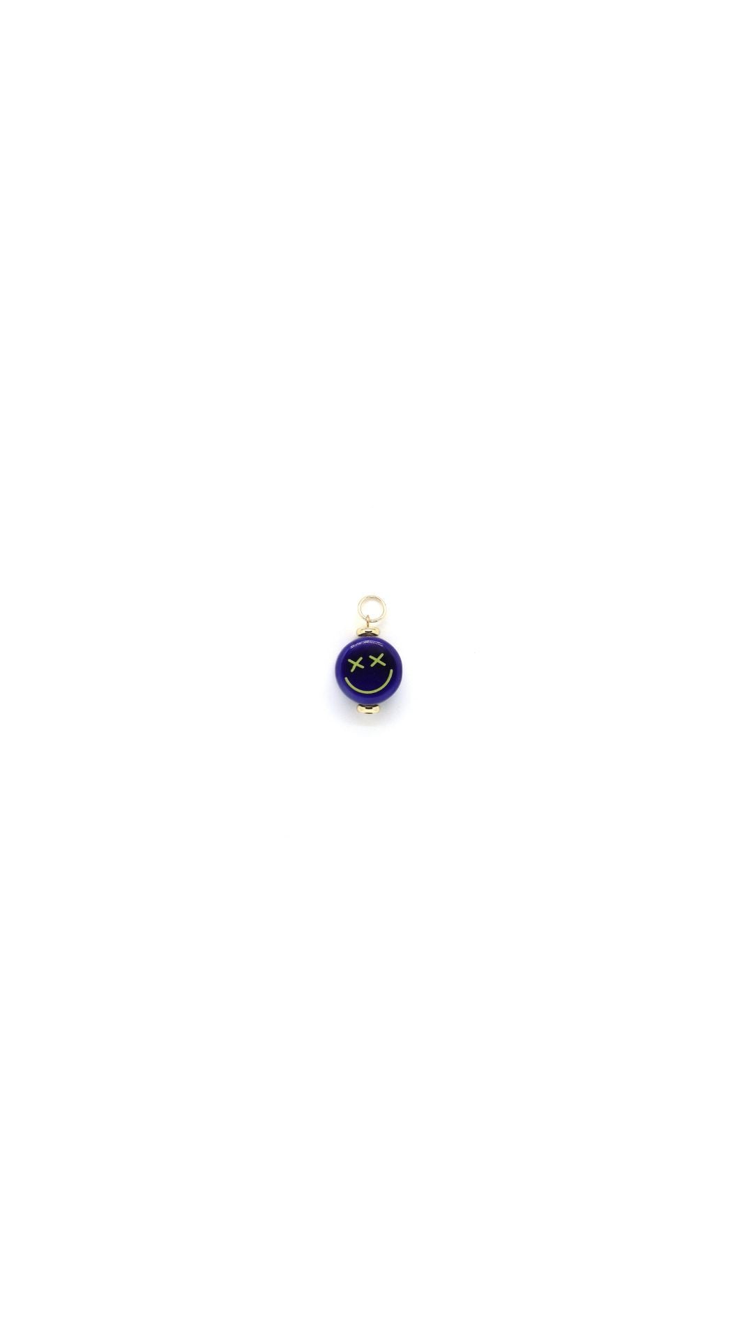 Ceramic blue crossed eyes smiley face charm by Nayda De Jesus