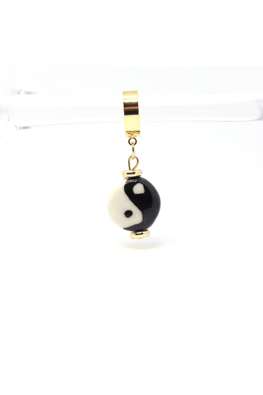 18K gold plated yin yang dangle huggies on white backround