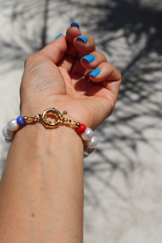 wrist shot of Handmade pearl and glass bead bracelet by Nayda De Jesus