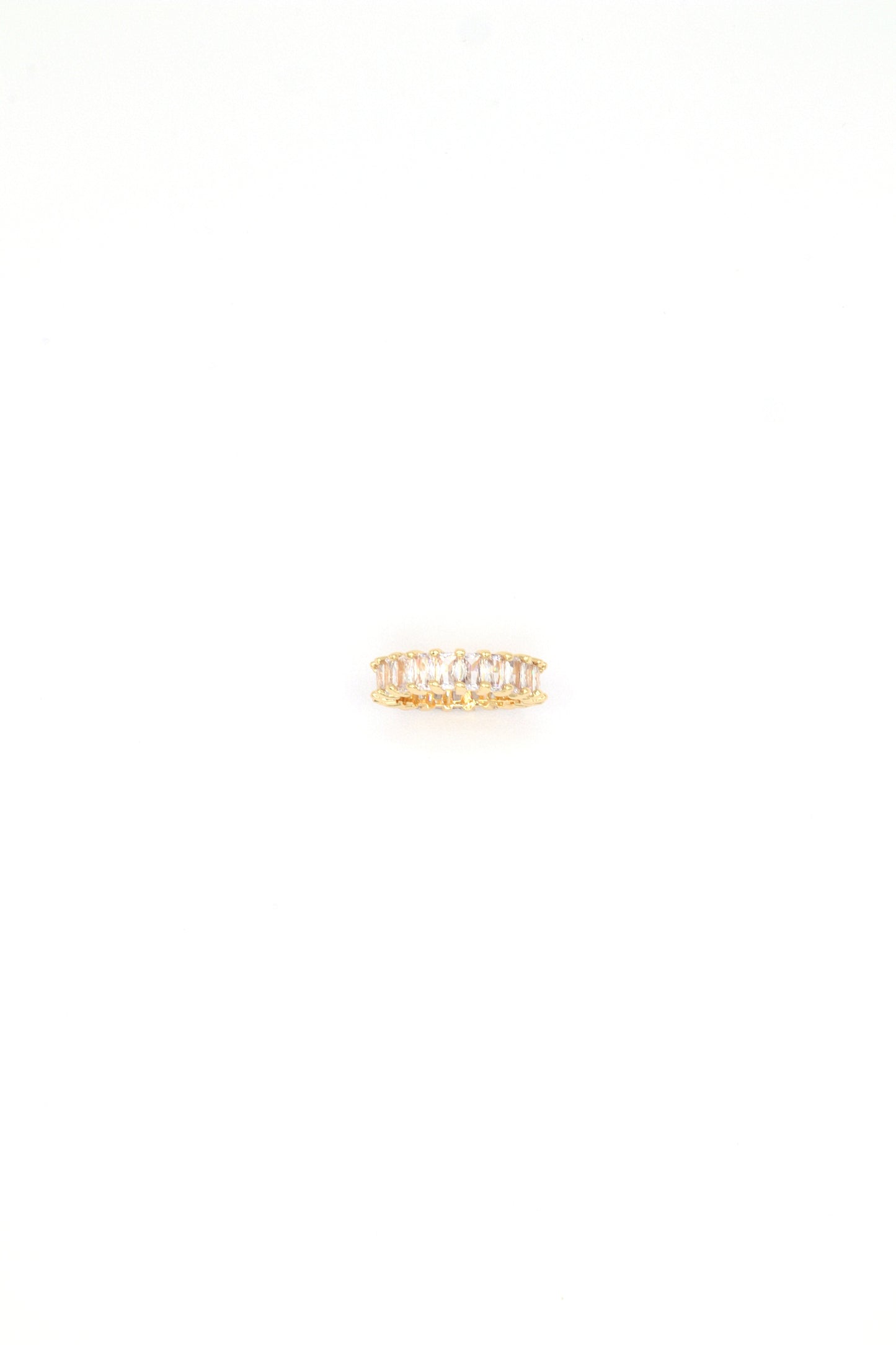 18K gold plated baguette eternity ring with cubic zirconia stones by Nayda De Jesus