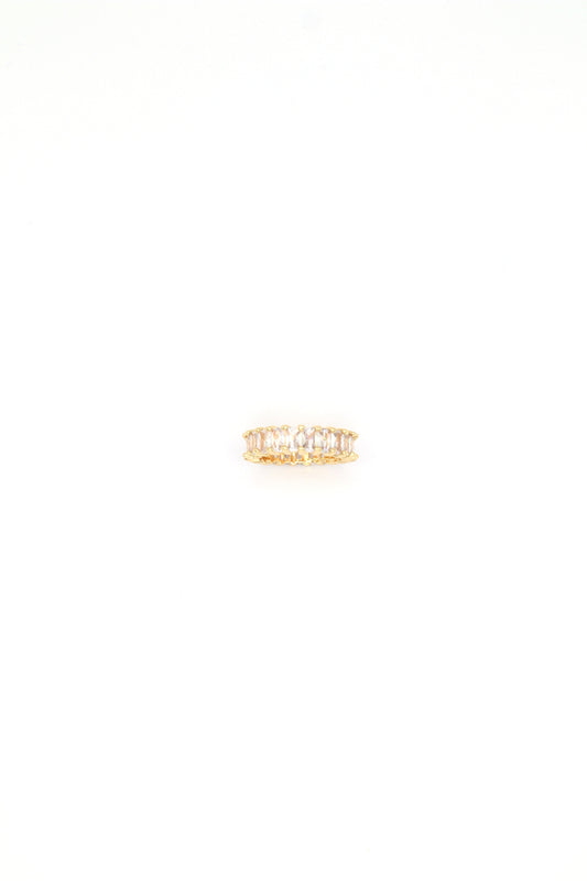 18K gold plated baguette eternity ring with cubic zirconia stones by Nayda De Jesus