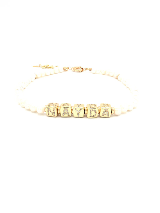 Customizable 24K gold plated rhinestone cube letter necklace with freshwater pearls by Nayda De Jesus