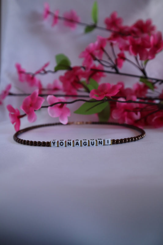 Custom brown glass beads necklace with “Yonaguni” cube letters