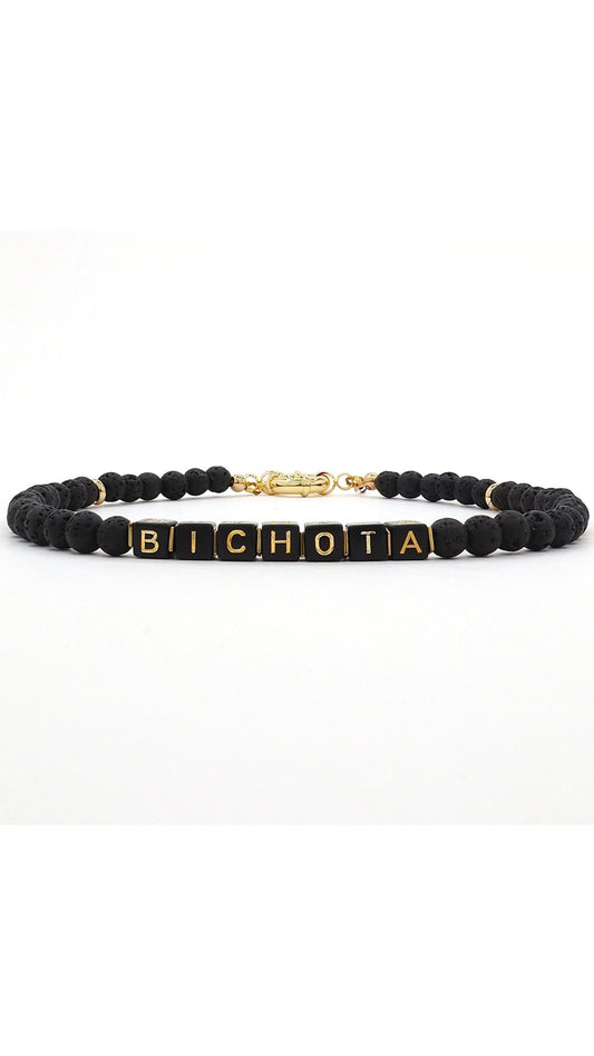 Custom black lava bead necklace with “Bichota” gold cube letters