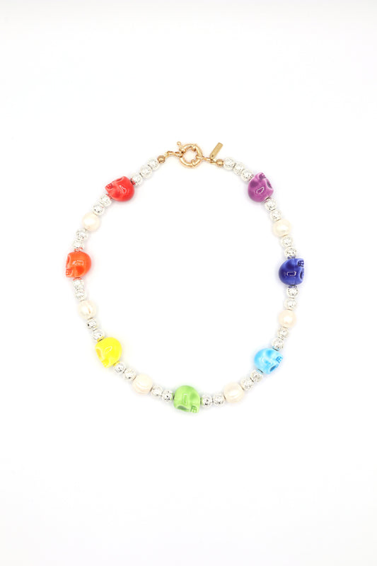 Handmade necklace with rainbow ceramic skull, pearls, and metallic lava beads