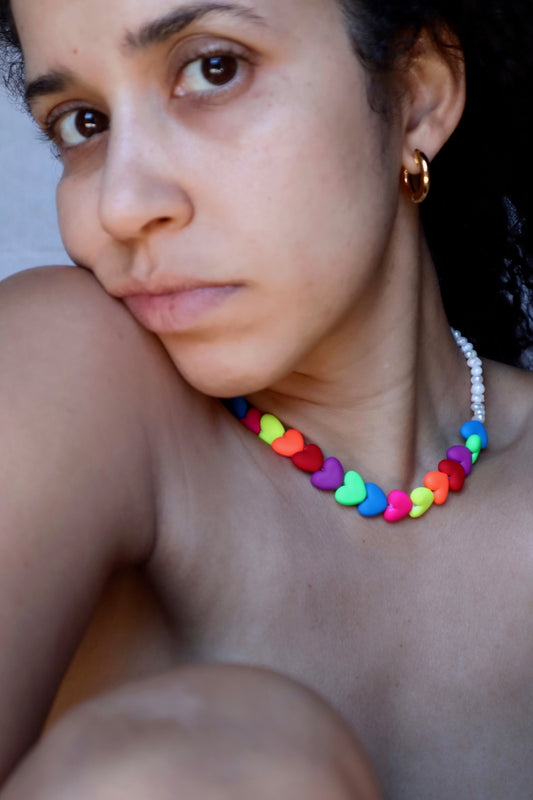 Colorful  hearts and pearls necklace displayed on model