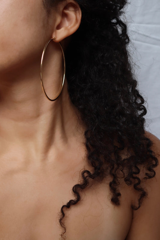 70mm Stainless Steel Statement Hoop Earrings on model