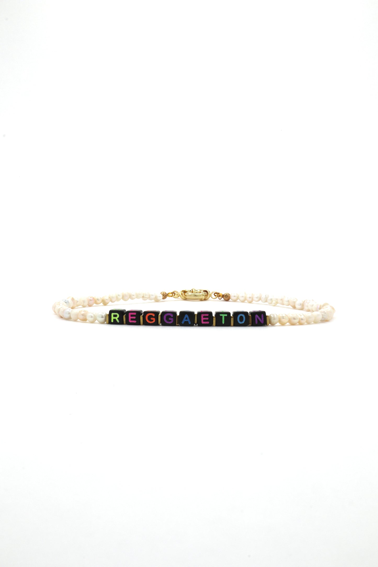 Custom neon letter necklace with freshwater pearls that says "Reggaeton"
