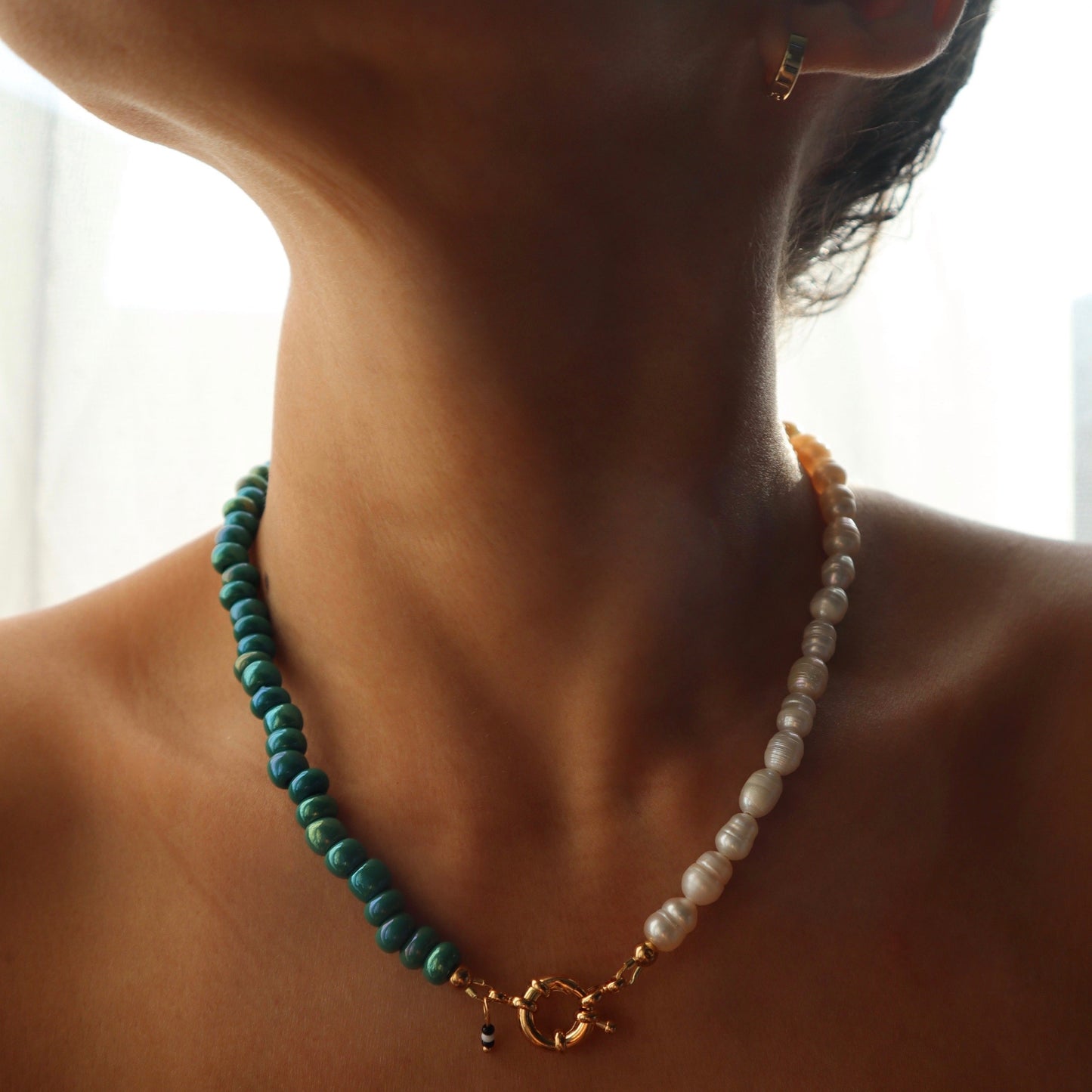 18K-gold-plated-huggies-hoops-on-model
