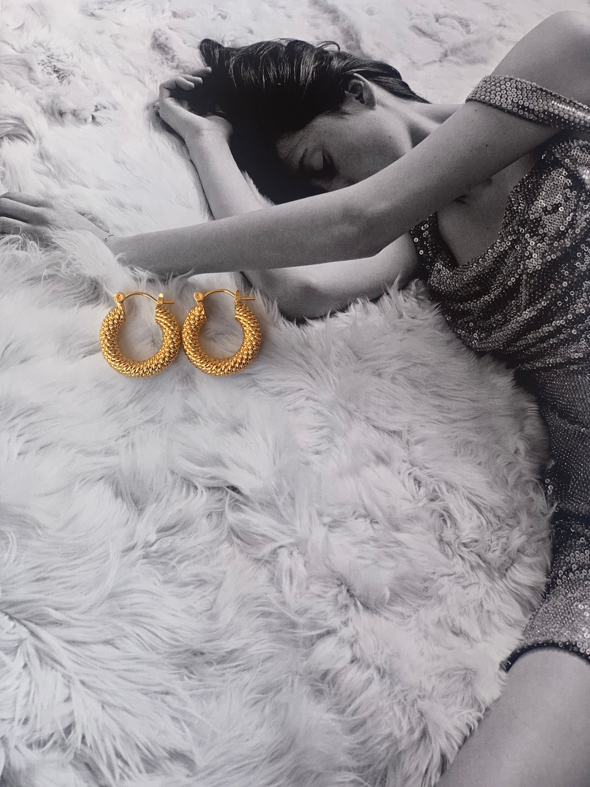 18K-gold-plated-texture-twisted-earring-hoops-on-magazine