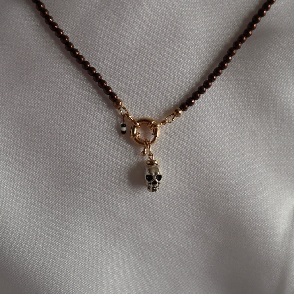 brown-glass-beads-18k-spring-clasp-closure-with-metal-skull-charm-hanging-on-clasp