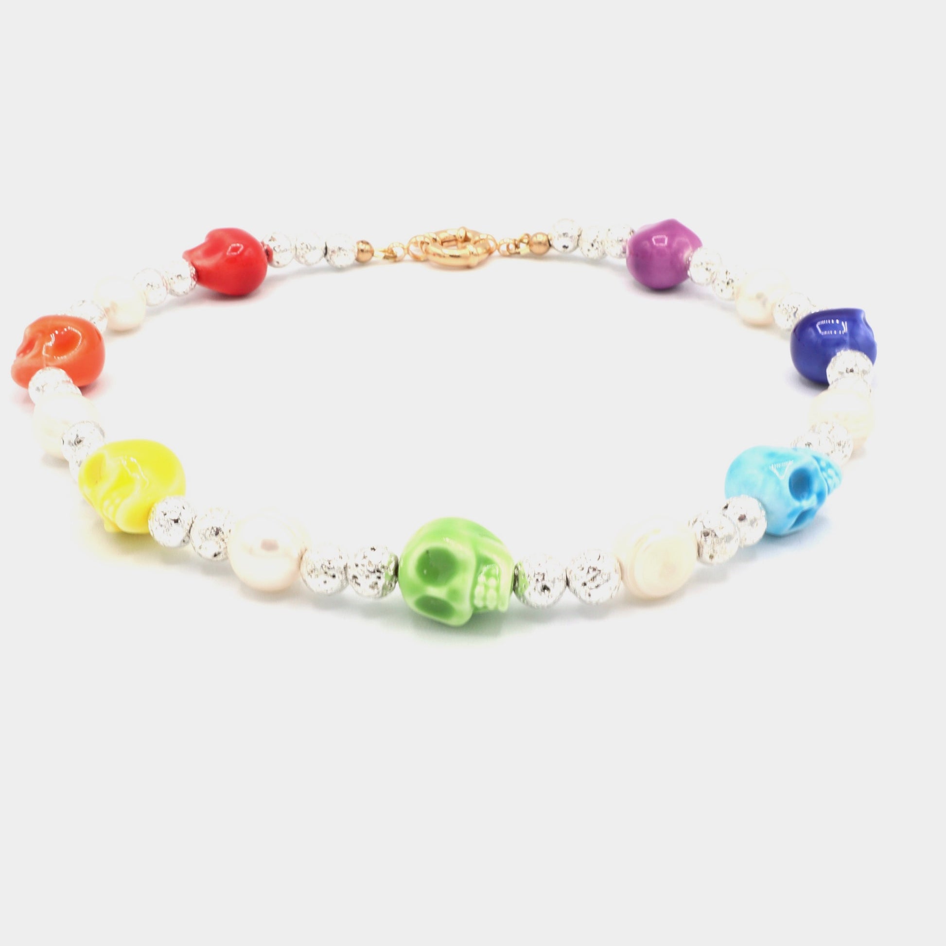 caly-necklace-made-with-rainbow-colors-ceramic-skull-and-freshwater-pearls-along-silver-lava-beads-18-k-gold-filled-spring-clasp-closure-by-nayda-de-jesus