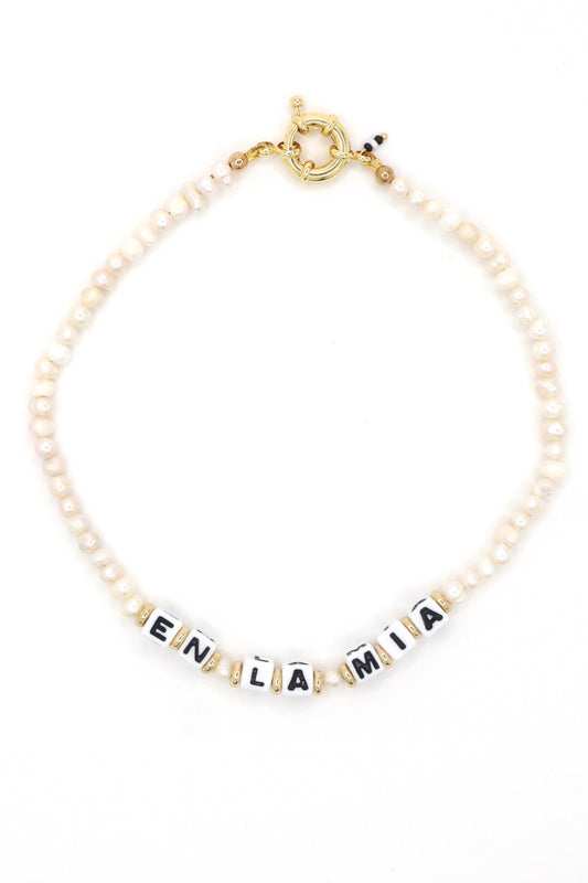 Custom freshwater pearl necklace with "En La Mía" cube letters