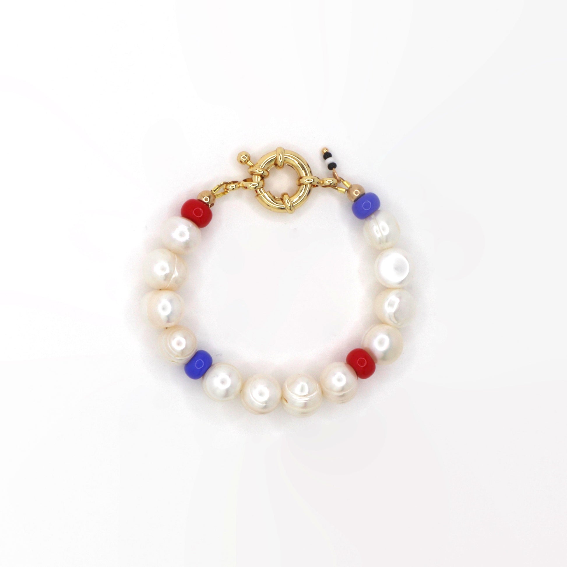     franco-bracelet-hand-made-with-freshwater-pearls-blue-and-red-glass-beads-along-18-k-spring-clasp-by-latina-artist-nayda-de-jesus