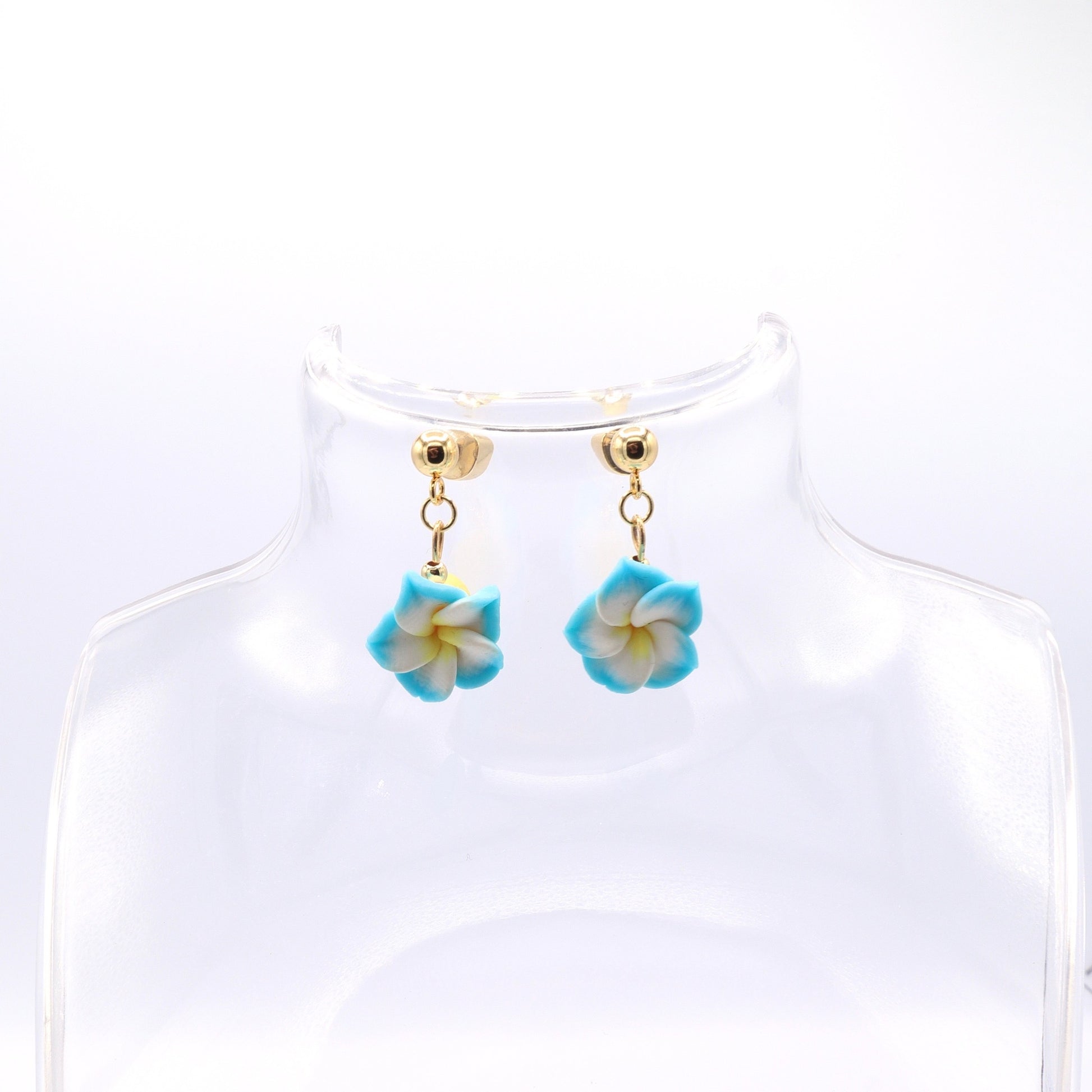 plumeria-earrings-made-of-clay-blue-white-yellow-tropical-flowers-with-18-k-ear-pins-by-latina-artist-nayda-de-jesus