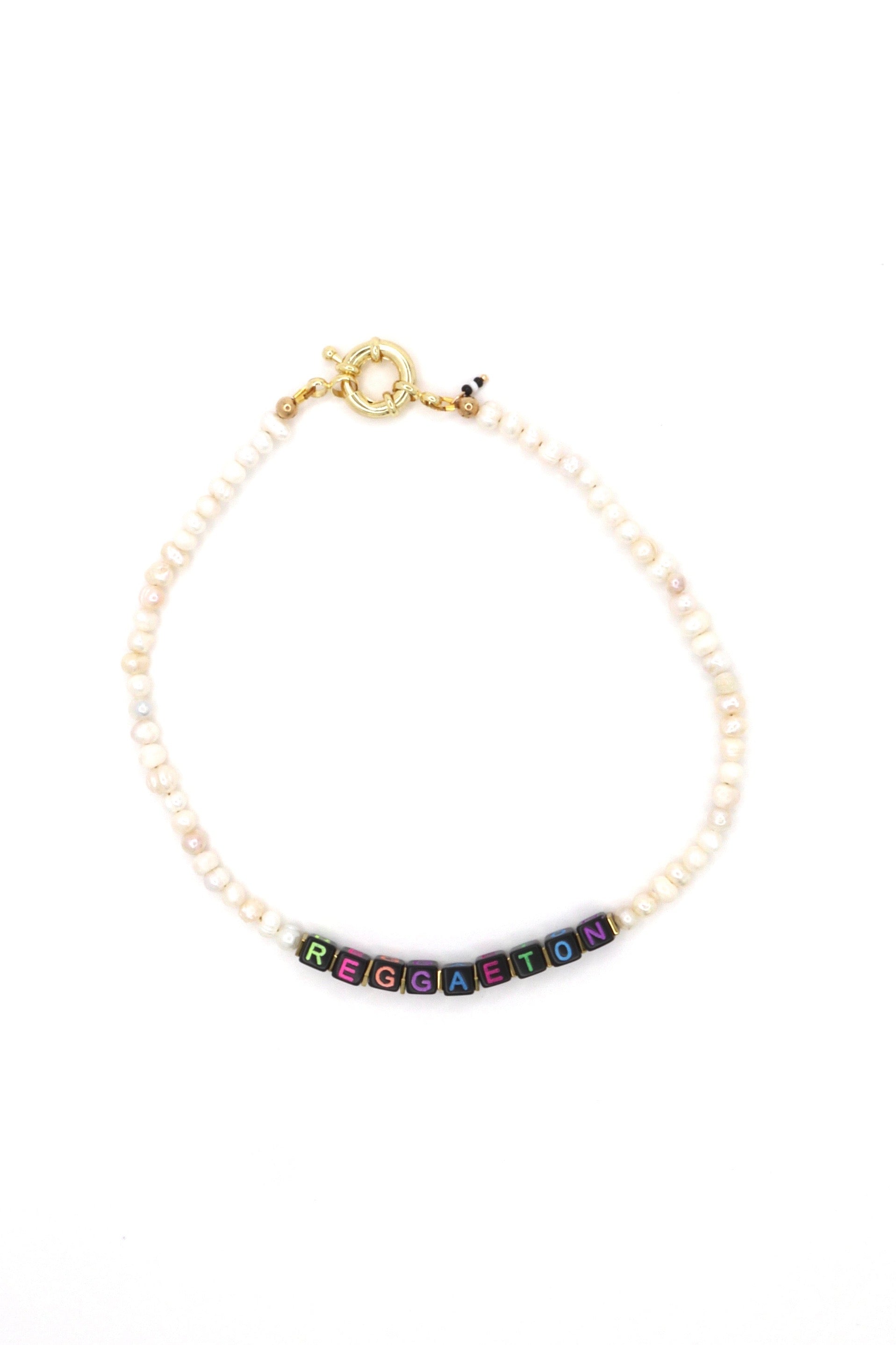Cultural jewelry piece customized with "Reggaeton"