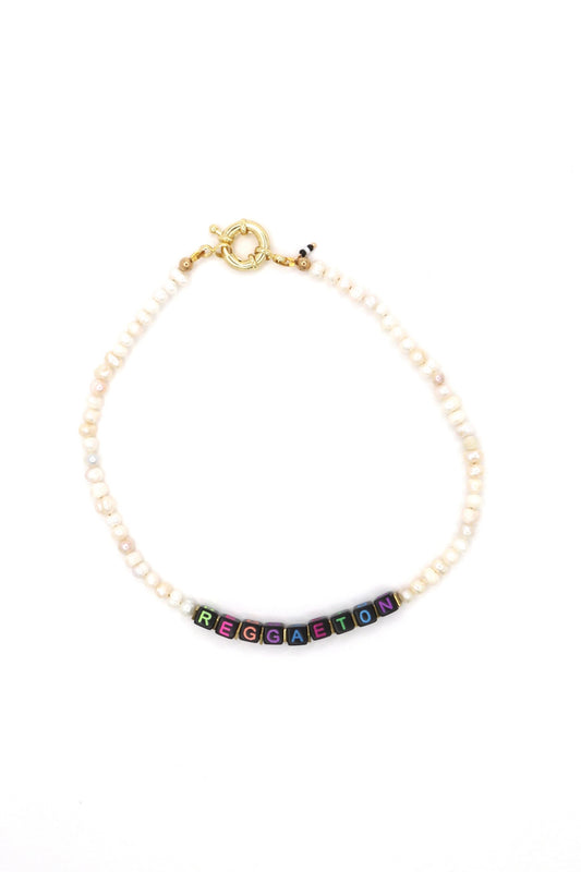 Cultural jewelry piece customized with "Reggaeton"