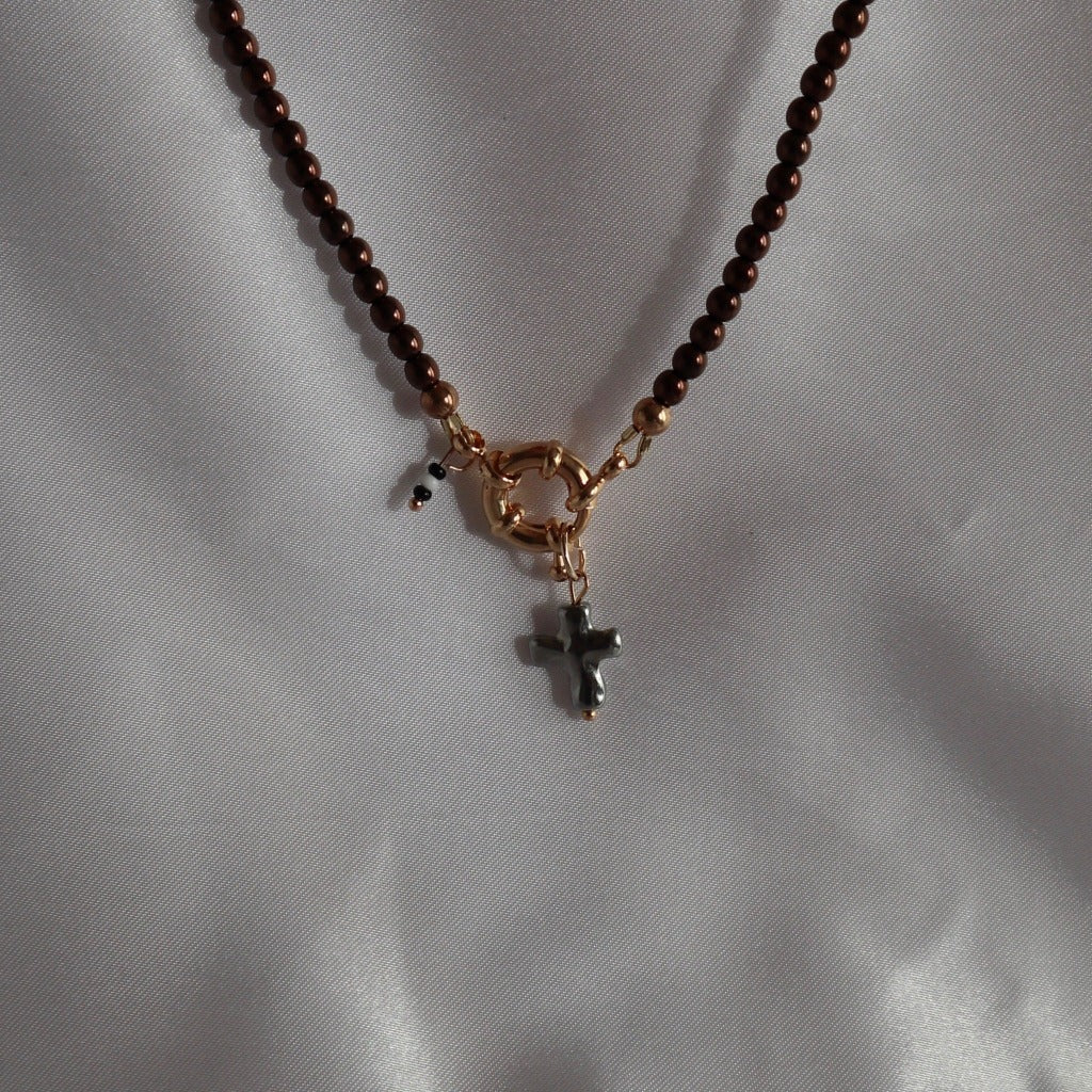 metal-cross-leonor-charm-by-nayda-de-jesus